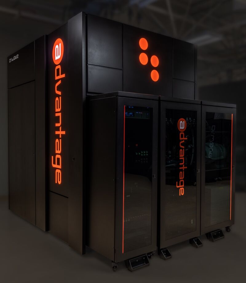 Image of a black cabinet with orange logos and text.