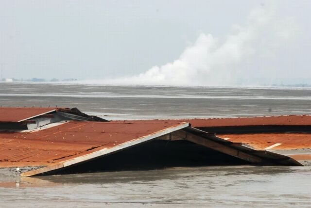 The mud onslaught forced tens of thousands of people to relocate from their homes. 